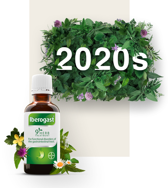 Date 2020s surrounded by leaves, current white and green bottle of Iberogast with its matching packaging next to it.