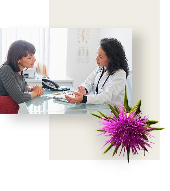 Female physician talking to her female patient.