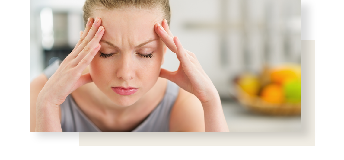 Woman suffering from headache
